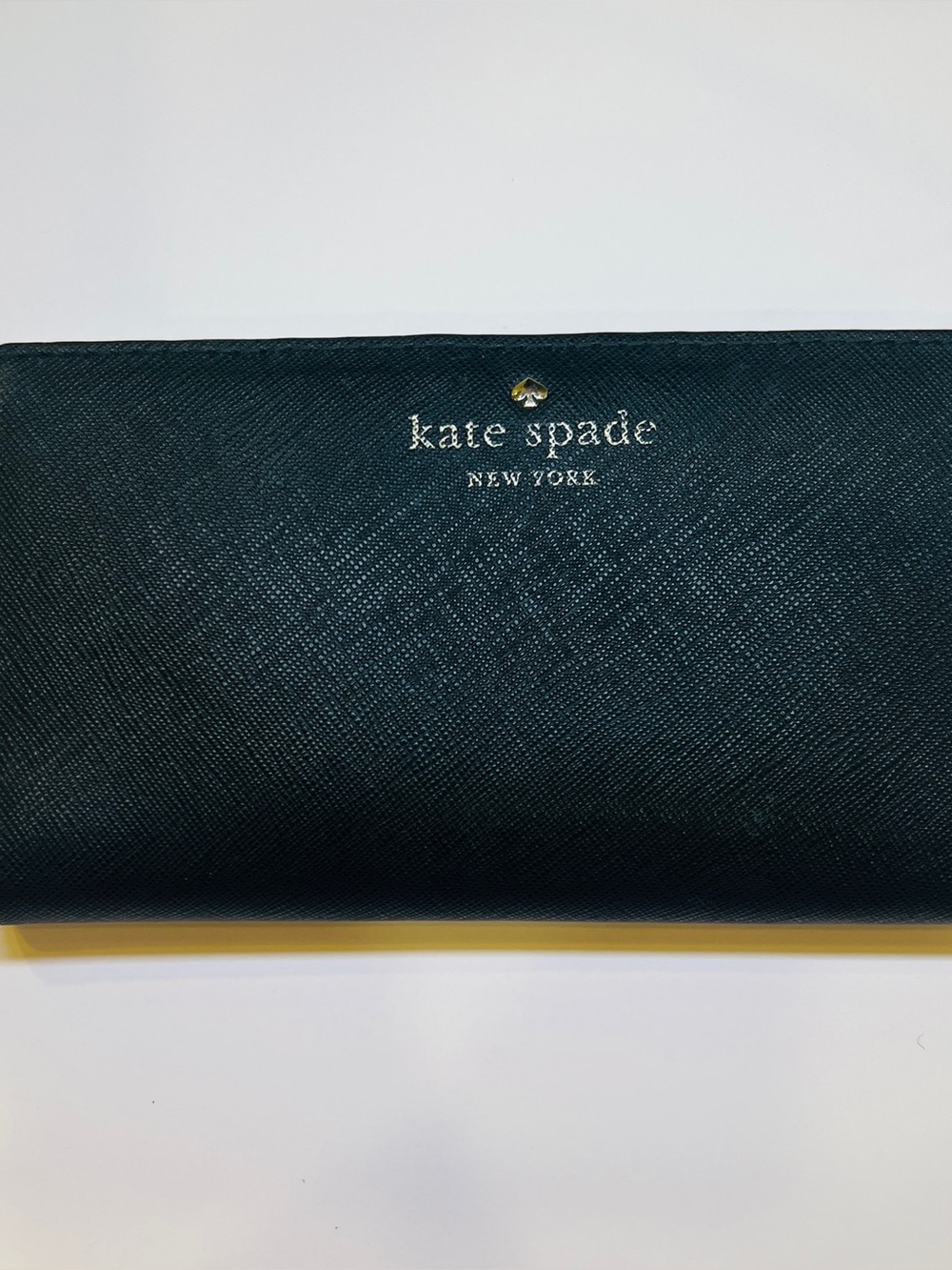 kate spade black saffiano continental wallet with gold logo